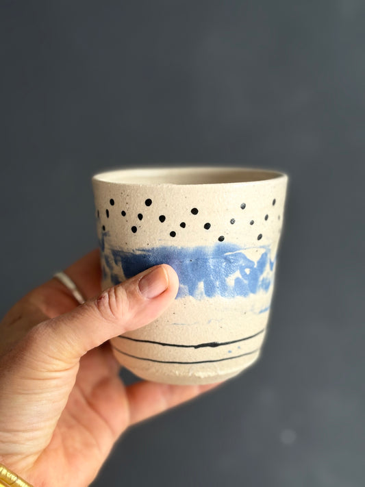 Black and blue beaker